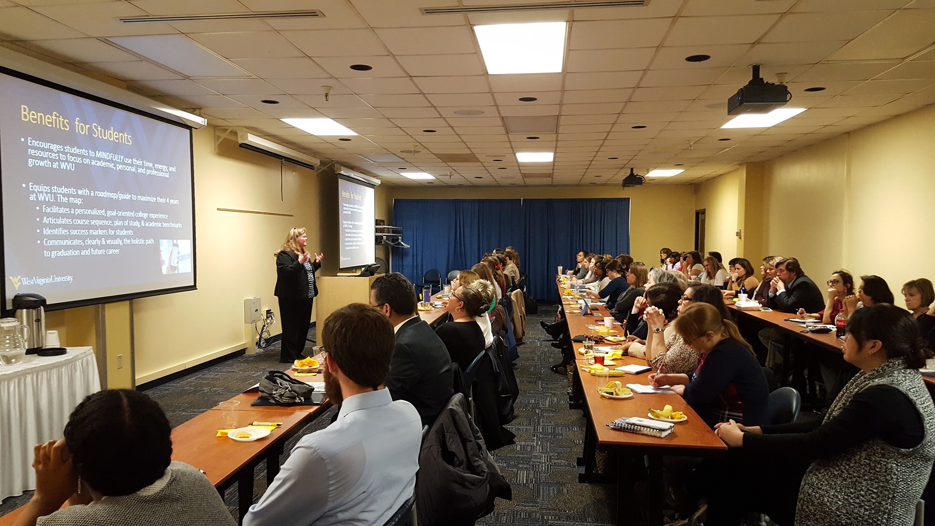 student listening to a speaker for Frontline Professional Speaker Series